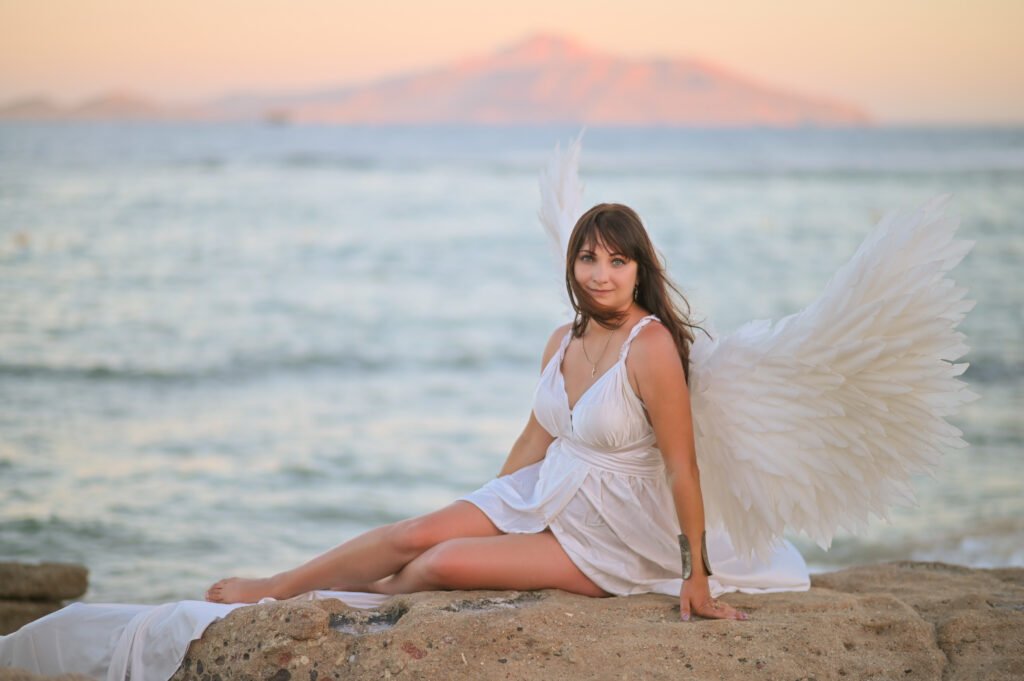 Individual posing for Sharm portrait photos by the beach.