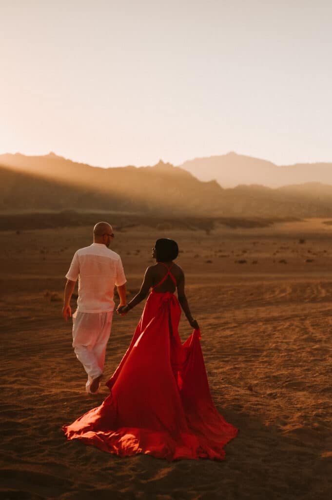 Couple posing during a mountain photoshoot in Sharm El Sheikh’s Sinai peaks at sunrise.