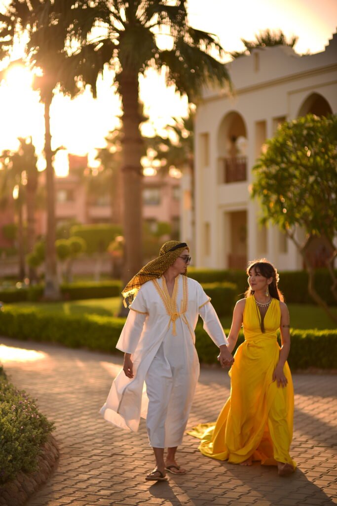 Couple exchanging vows on Sharm El Sheikh beach during wedding photoshoot
