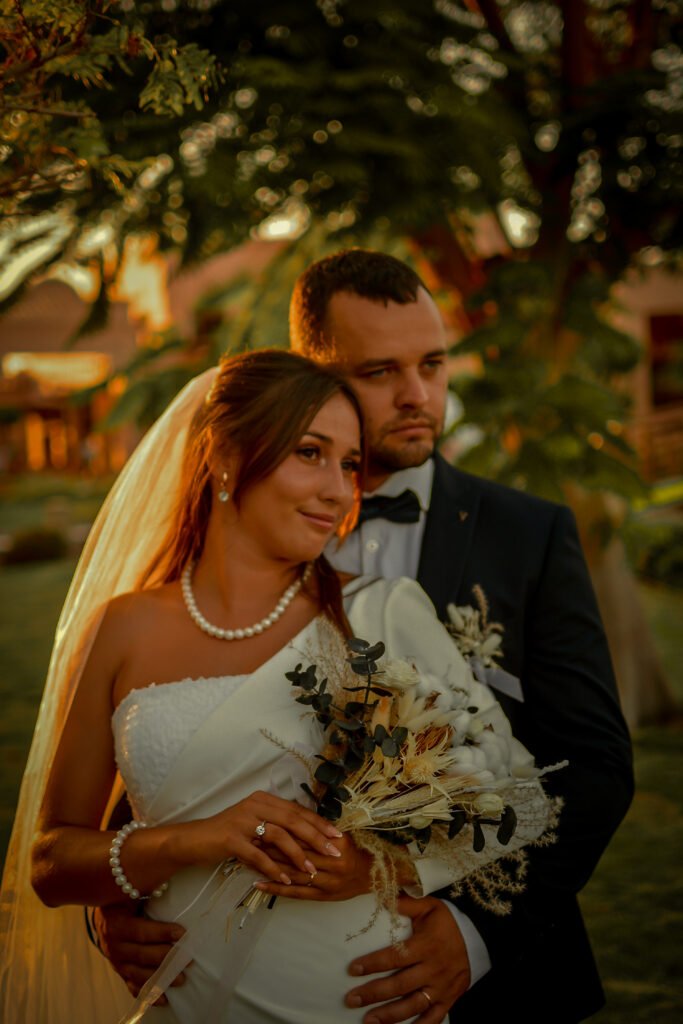 Bride posing for Sharm wedding photos at sunset.