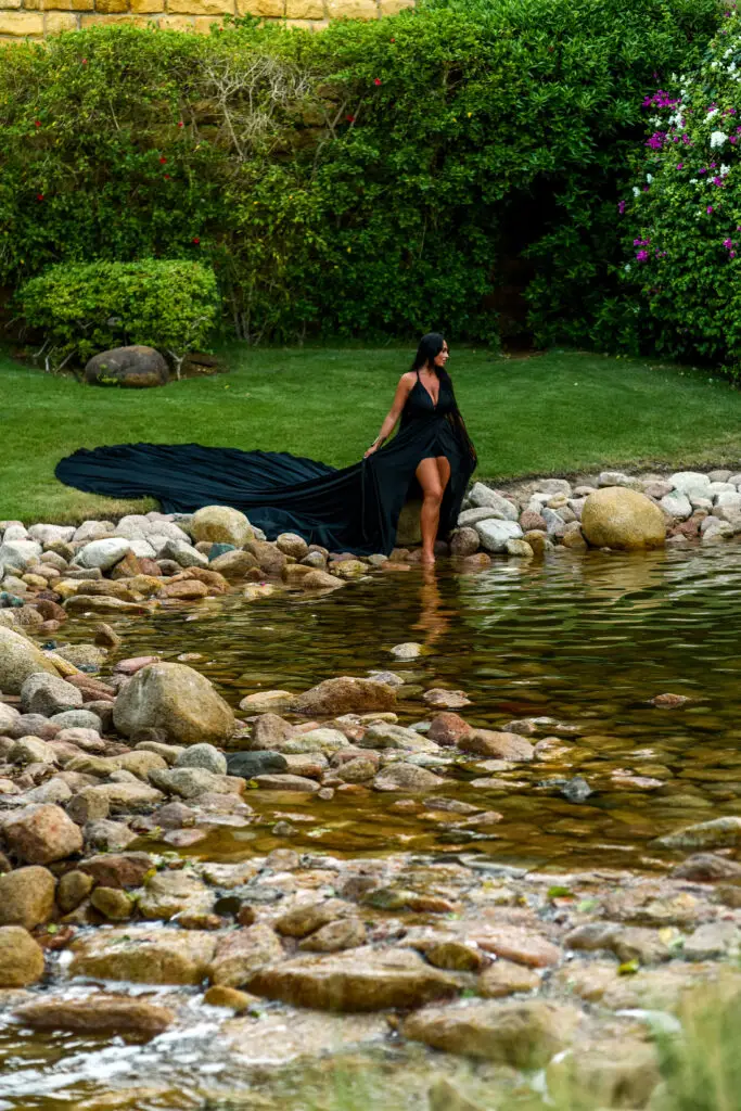 Professional photographer in Sharm capturing a beach photoshoot with a flying dress