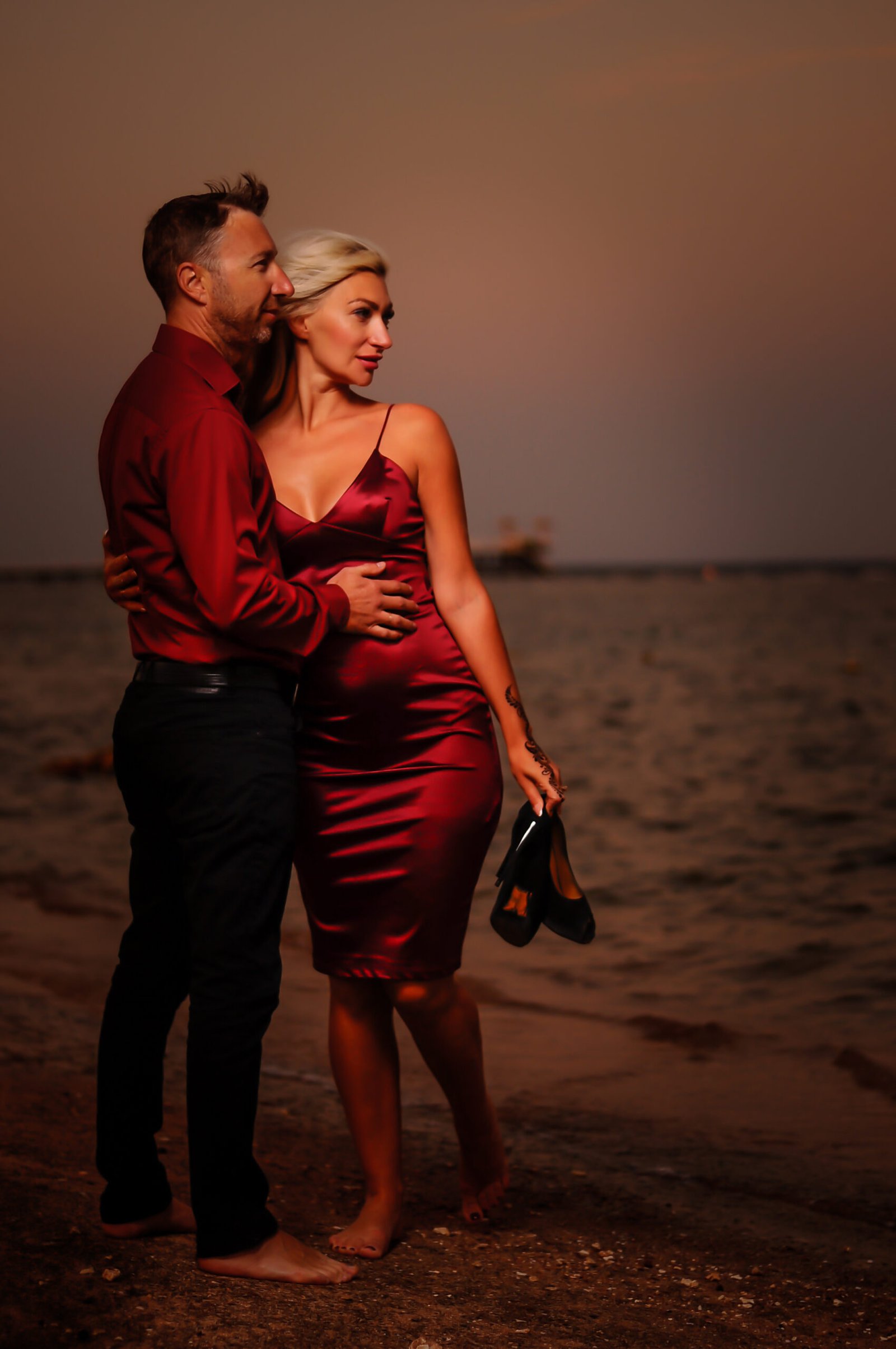 Sharm Photographer capturing a romantic honeymoon photoshoot in Sharm El Sheikh at sunset
